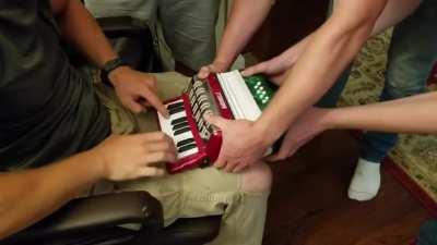 Doom E1M1 being played on an accordion.