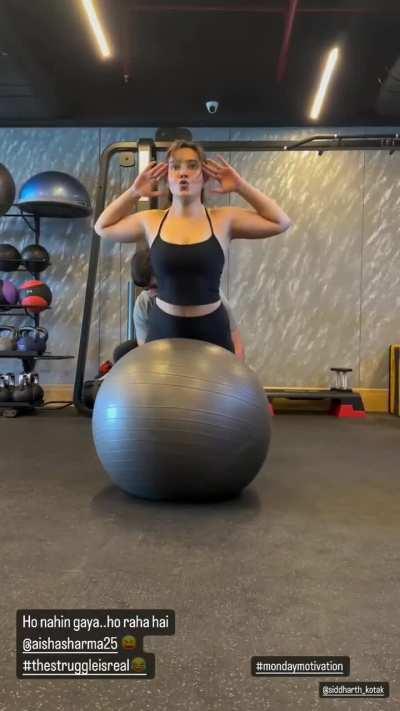 Neha Sharma's deep cleavage during workout