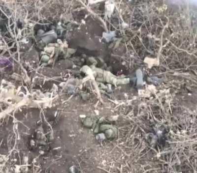 Russian soldiers taking fire from UA forces and attempt to surrender, multiple casualties visible.