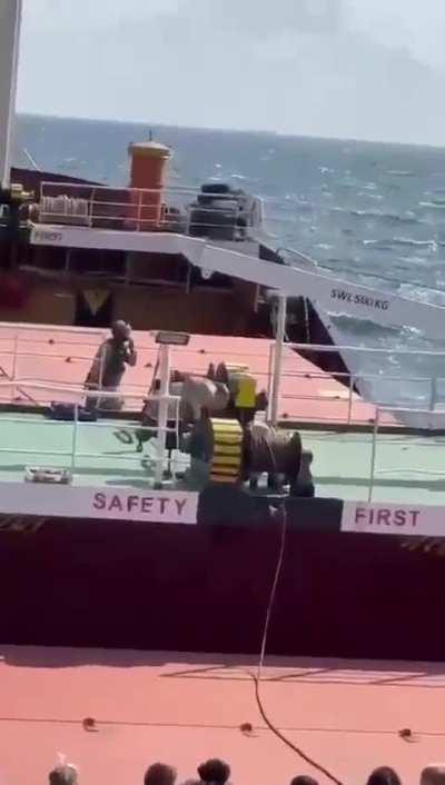 Russian marines boarding a ship.