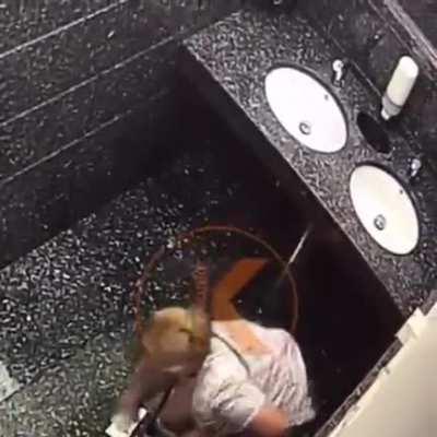 1 pees in the sink while the other is lookout, and then they switch.