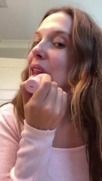 Putting on Lip Gloss | TikTok | October 30, 2024
