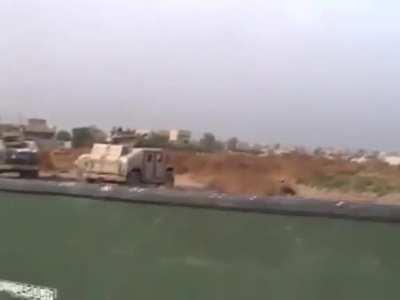 Intense moment of an RPG nearly hitting US troops during a firefight between Iraqi Insurgents and the 2/24 Marines in Yusufiyah, Iraq
