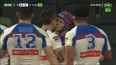 Ponga greets Uncle Mitch with a kiss after scoring a try