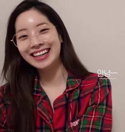 Dahyun waving and laughing