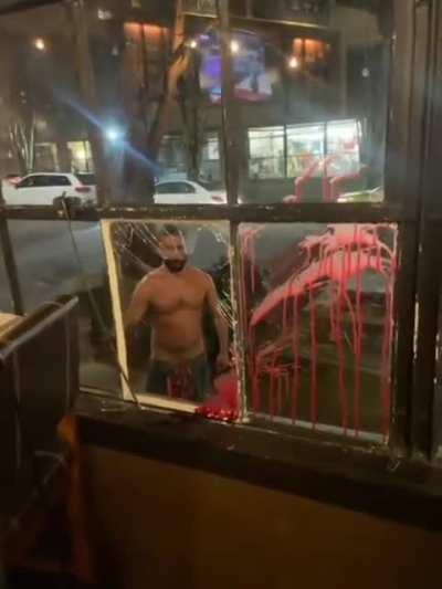 Man punches true window