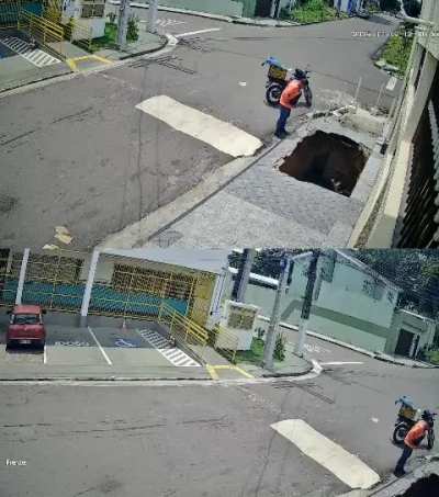 Walking DOWN the street.