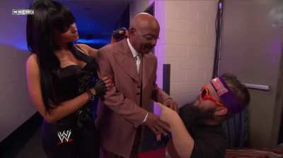 Teddy Long inviting Aksana to his office