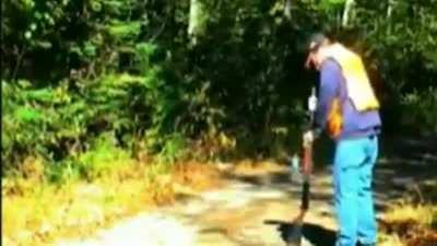 Guy almost kills himself looking down the barrel of his gun