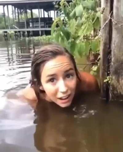 Catching a chonker of a cat fish with her arm