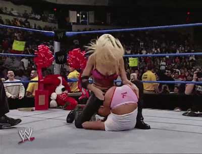 Torrie Wilson spanking Nidia