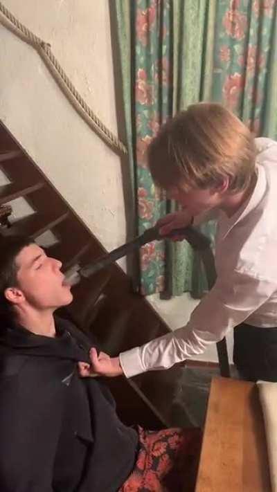 Vacuuming the soul out of this guy