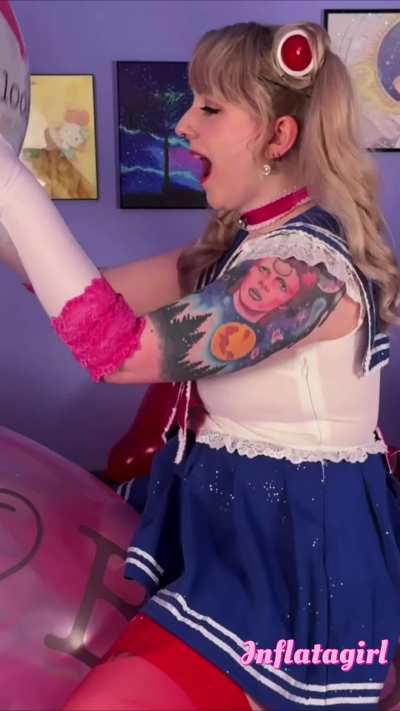 Sailor Moon playing on an airship balloon by Inflatagirlxoxo