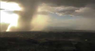 A stunning microburst of rain dumping thousands of gallons in a matter of minutes