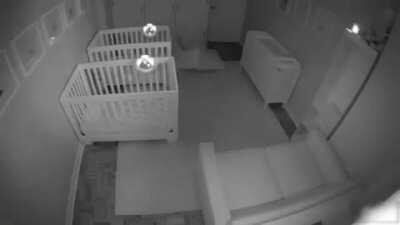 Just some parents trying to put their twin kids to bed and go to sleep