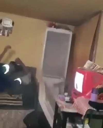 Guy throws a firecracker into the fridge