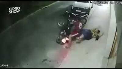 sitting on the back of the bike