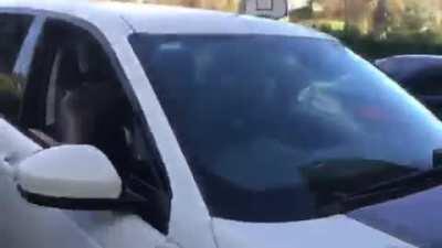 Kid crashes his dads car while filming a video
