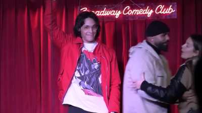 white lady says n-word at comedy show and tries to take the microphone.