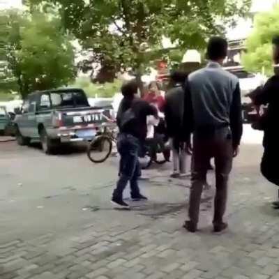 Women attacking workers