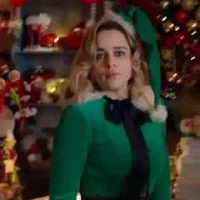 Emilia Clarke realizing that Santa came for more than just her milk and cookies
