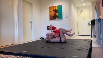 August Hayashi traps her opponents' face between surprisingly strong thighs