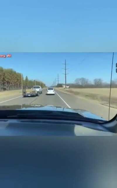 Not letting a truck pass in a passing zone