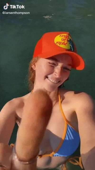 redhead having fun at the lake