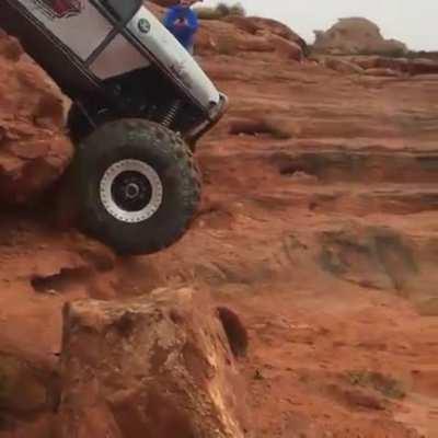 Driving down a vertical cliff face...