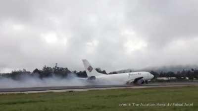 737 Gear-Up Landing while a 737 sits in the grass after a runway excursion