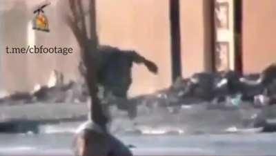 Armour plate saves a US soldier after getting hit by a sniper in the back (Iraq unknown date)