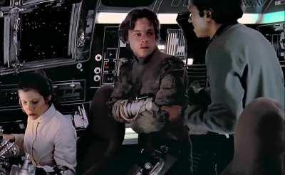 I love this short but sweet scene in Empire. Lando taking the time to check in on Luke, whom he has barely met. Luke, acknowledging him while fighting his shock and pain. Leia, taking control of the ship but having a close eye on them both.