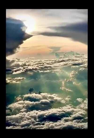Different types of cloud at different heights taken from a plane