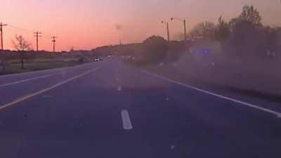 Crazy footage of a PIT maneuver resulting in the police car flying over the suspect and taking out multiple light poles