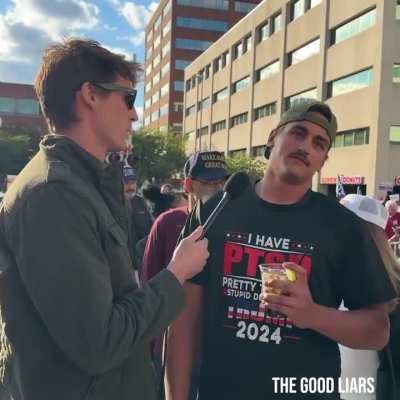 MAGA man with ‘PTSD: Pretty Tired of Stupid Democrats’ shirt can’t name the 3 branches of government. His friend asks what that has to do with politics.