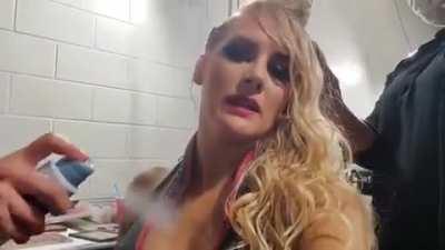 Lacey Evans getting her titties sprayed