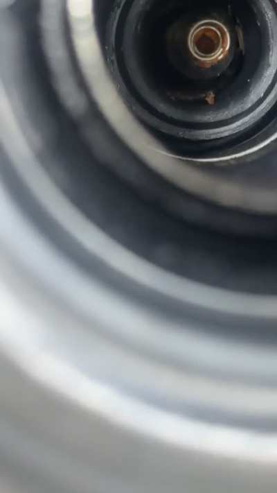 Is this a snapped off spark plug ?