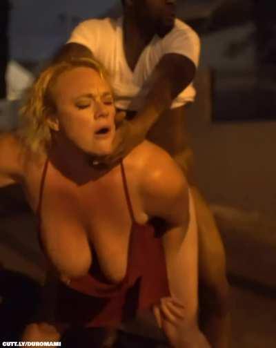Blonde top heavy milf in a red dress can't wait and gets her cheeks clapped in public