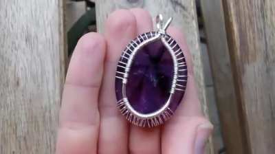 I made a tree pendant with an amethyst gemstone.