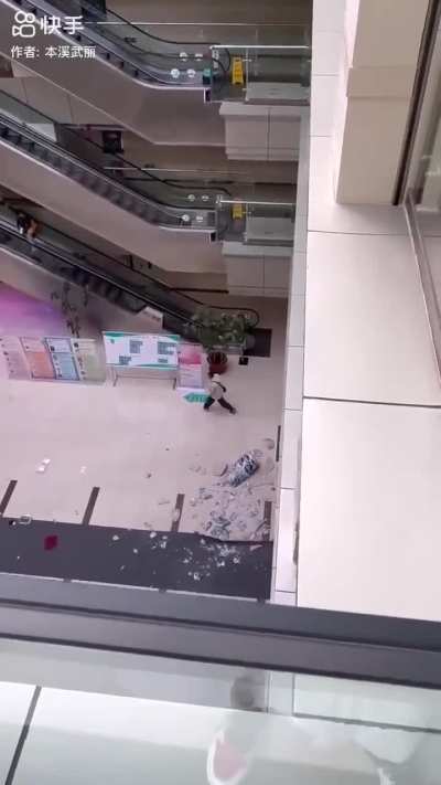 Guy rampaging in hospital lobby , China