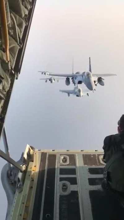 Photographer attempts to get a bunch of F-15's to line up for his shot.