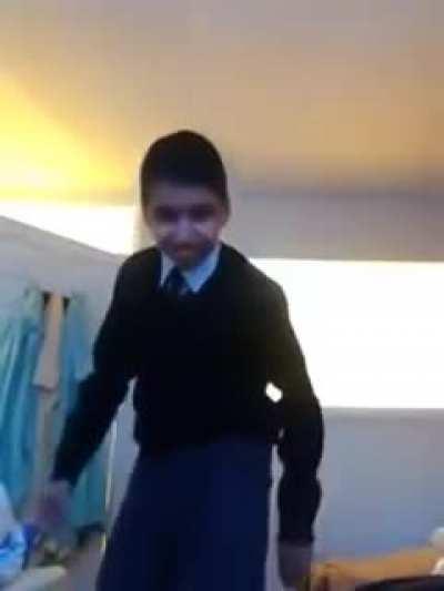 Kid dances to Disco music.