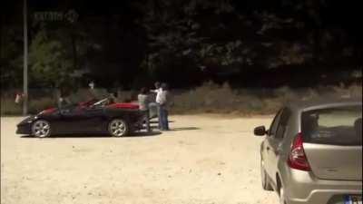 Lance Stroll interrupts James May's Dacia Sandero crash