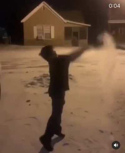 Kid decides to throw boiling water in the snow, ends in a little shock...