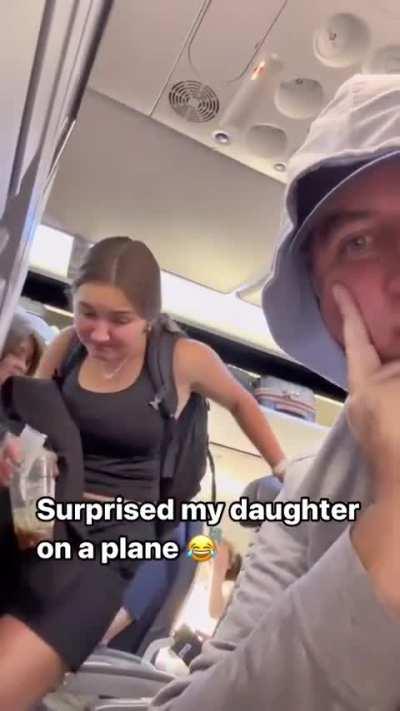 Dad surprised daughter in the airplane