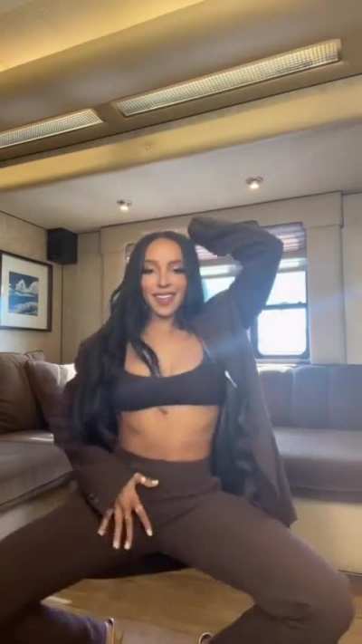 Tinashe Squatting Down 