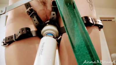 Nipples clamped and balancing on my tiptoes so they stay that way...while the wand mercilessly buzzes away