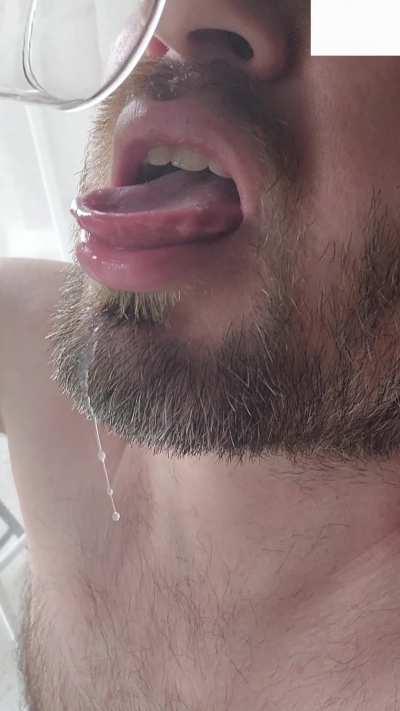 Naked at the window swallowing 