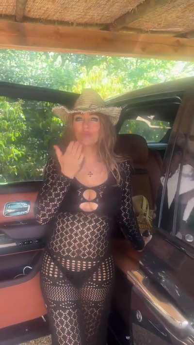 Elizabeth wearing black swimsuit | IG 7/23/24