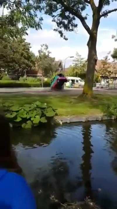 Jumping over a river in a car